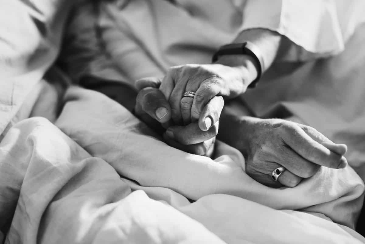 trusts - couple holding hands